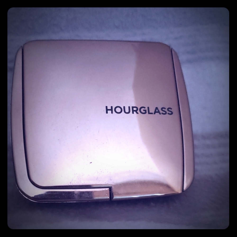 Hourglass in Luminous Bronze Light